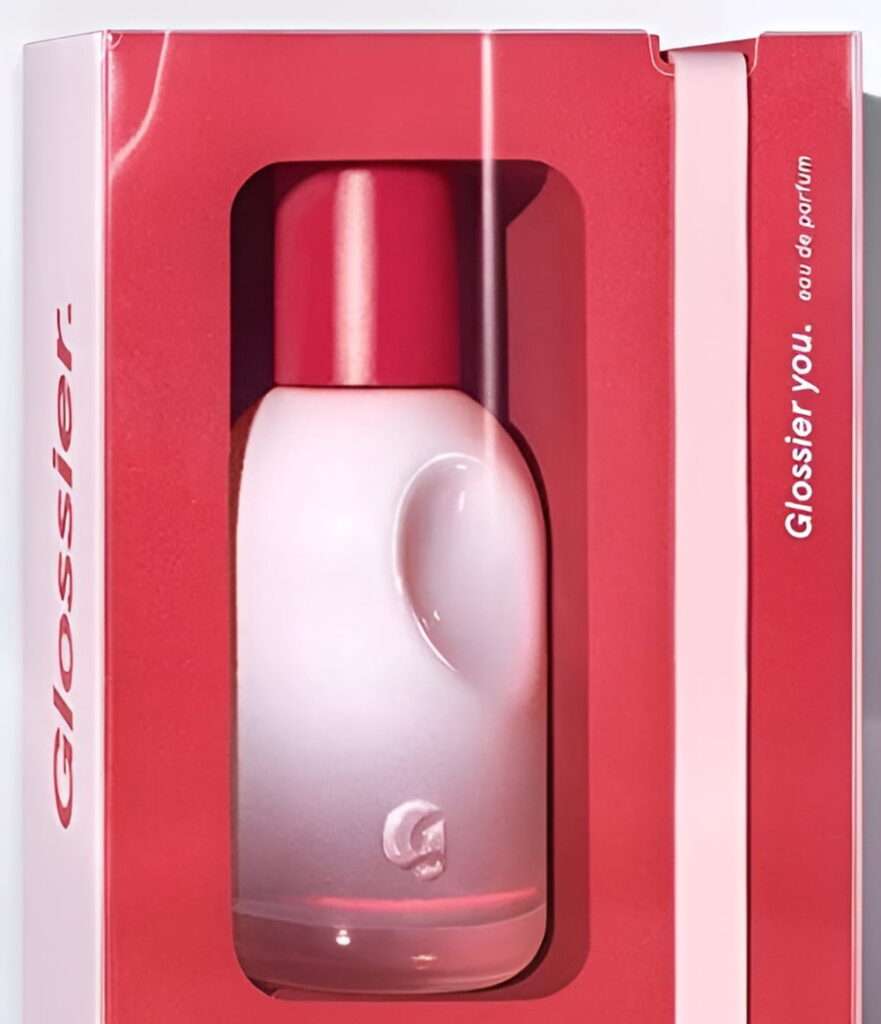 Botol parfum Glossier You berwarna pink blush yang compact dan modern, mengandung aroma musk, ambrette, dan iris untuk menciptakan wangi yang personal dan melekat di kulit. Parfum signature dengan kesan intimate dan hangat.