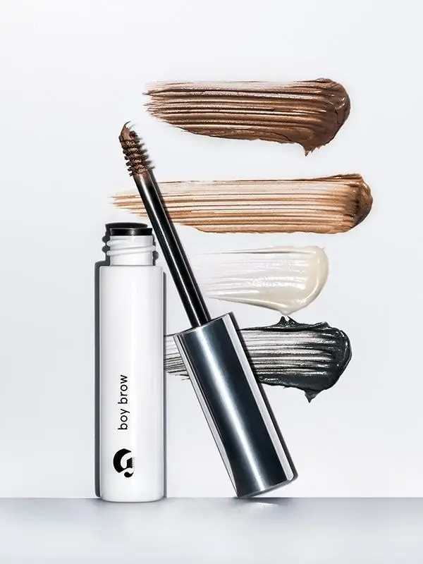 Produk alis Glossier Boy Brow dalam kemasan tube mini dengan spoolie aplikator, tersedia dalam berbagai warna natural untuk menata dan mengisi alis secara effortless. Cocok untuk menciptakan alis rapi namun tetap fluffy dan natural.
