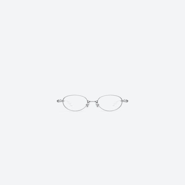 Kacamata oval logam perak mengilap dengan lensa bening dari Pocket Collection, model ringan dan modern